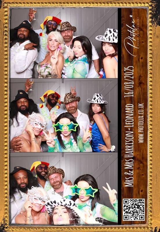 photo booth wedding big group having picture taken print out